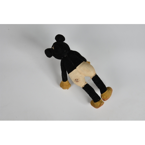 205 - An early 1930s Deans Rag Book Mickey Mouse with internal poseable wire rods inside the limbs, in bla... 