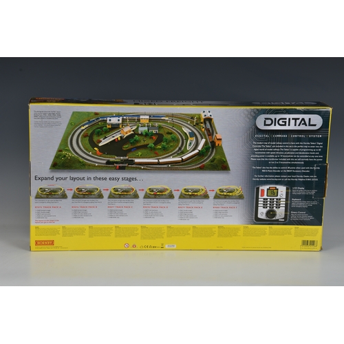 207 - A Hornby OO Gauge Digital R1126 Mixed Freight set complete, in the original box, with original Trakm... 