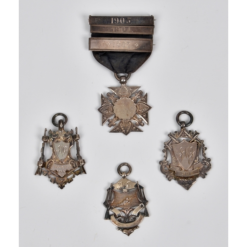 934 - Royal Jersey Light Infantry interest - Four silver shooting medals awarded to J. JÉGU, the first of ... 