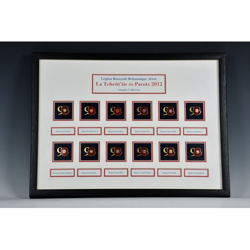 938 - Poppy Appeal 2012 - Cased set of twelve Jersey Parishes the framed well mounted display showing enam... 