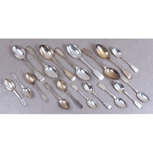 1204 - A quantity of silver bright cut fiddle pattern spoons the majority first half 20th century, Sheffiel... 