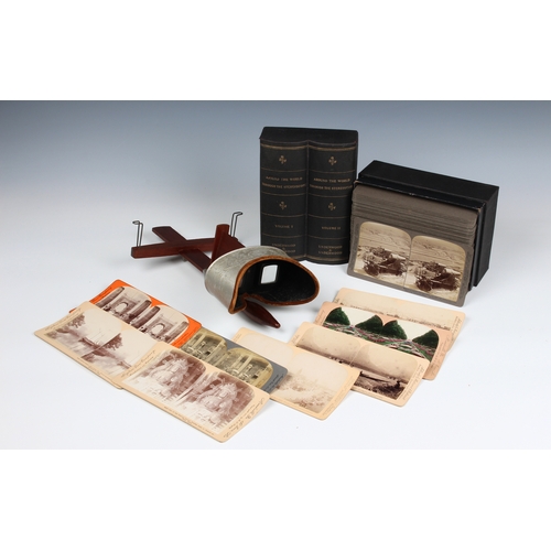 1209 - An Edwardian hand held stereoscopic viewer and stereocards including 