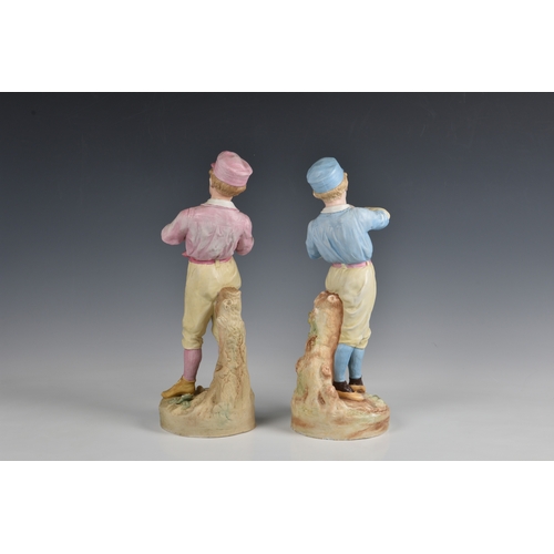 15 - A rare pair of German Heubach biscuit porcelain figures of baseball players  c.1890, the batter wear... 