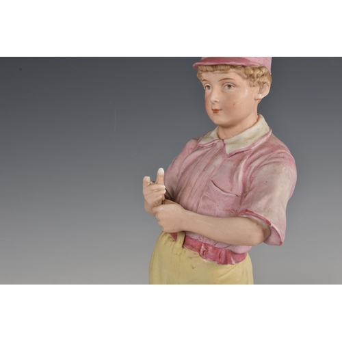 15 - A rare pair of German Heubach biscuit porcelain figures of baseball players  c.1890, the batter wear... 