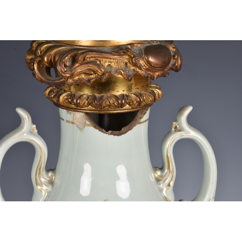 52 - A pair of 19th century porcelain vase lamps  probably French, the stout, baluster vases in a celadon... 