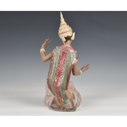 8 - Lladro Pottery figure of an Indonesian dancing girl  modelled kneeling wearing traditional dress, fa... 