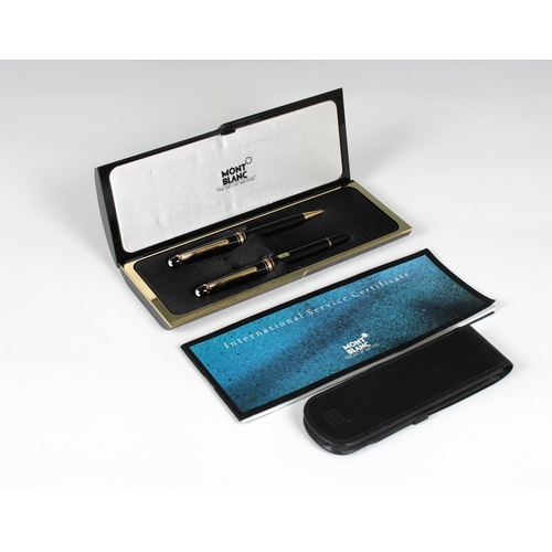 1121 - A cased Mont Blanc fountain pen and pencil set with leather pocket pouch.