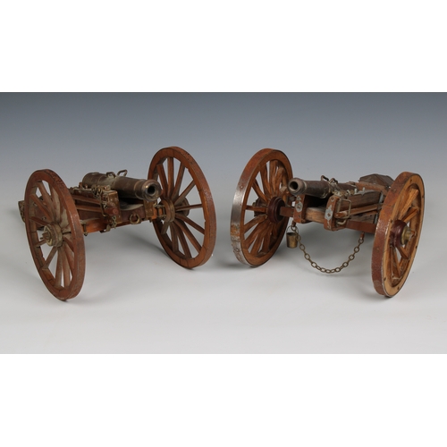 1123 - A collection of six 20th century model brass and wood cannons and mortars comprising an Armada Gun, ... 