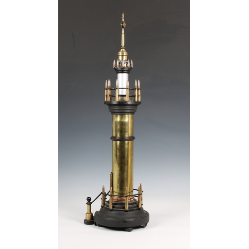 1124 - A large trench art lighthouse made with shells and bullets, the centre with turning cog and mechanis... 