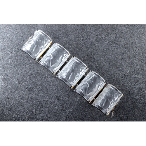 114 - Lalique - An 'Enfants Bacchantes' crystal bracelet five arched frosted panels depicting cherubs, sil... 