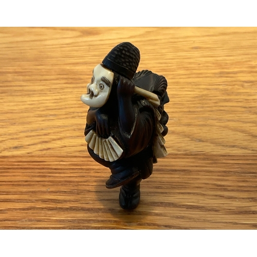 1221 - A RARE AND FINE WOOD NETSUKE OF AN OKINA DANCER Signed Shunsai, Japan, late 19th century, Meiji peri... 