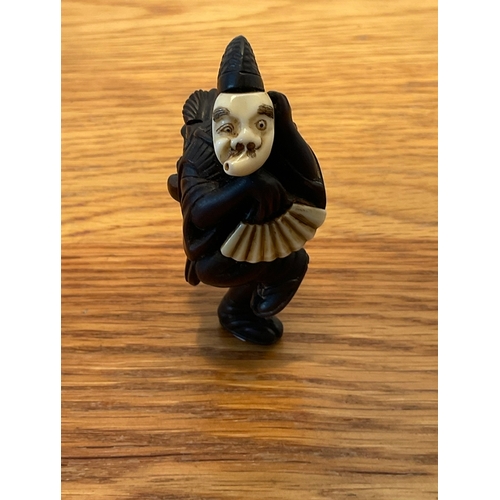 1221 - A RARE AND FINE WOOD NETSUKE OF AN OKINA DANCER Signed Shunsai, Japan, late 19th century, Meiji peri... 