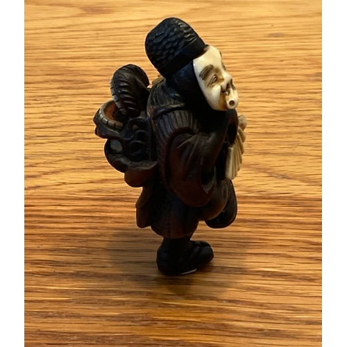 1221 - A RARE AND FINE WOOD NETSUKE OF AN OKINA DANCER Signed Shunsai, Japan, late 19th century, Meiji peri... 