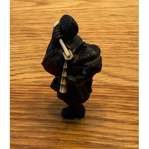 1221 - A RARE AND FINE WOOD NETSUKE OF AN OKINA DANCER Signed Shunsai, Japan, late 19th century, Meiji peri... 