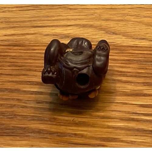 1222 - A WOOD NETSUKE OF A COWERING ONI Unsigned, Japan, Nagoya, 19th century, Edo period (1615-1868) The o... 