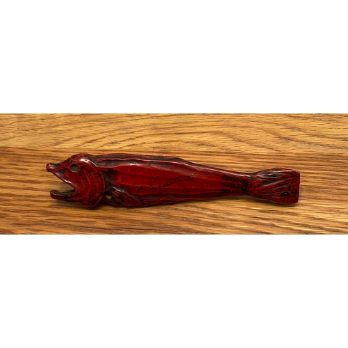 1223 - A LARGE WOOD NETSUKE OF A DRIED FISH IN RED Unsigned, probably Japan,19th century naturalistically c... 