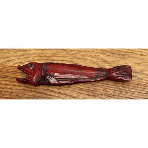 1223 - A LARGE WOOD NETSUKE OF A DRIED FISH IN RED Unsigned, probably Japan,19th century naturalistically c... 