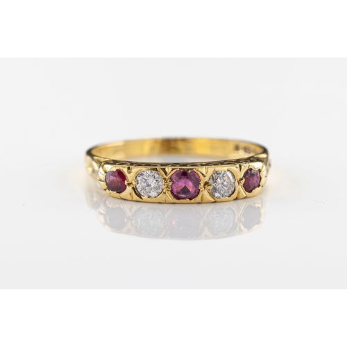 142 - An 18ct yellow gold diamond and ruby five stone ring set with two round cut brilliant diamonds, appr... 