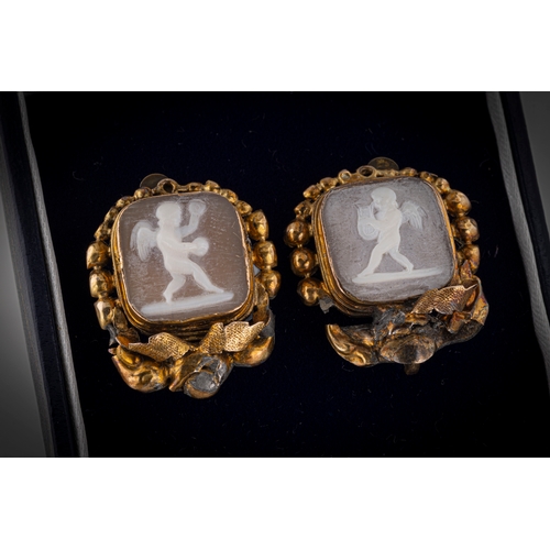 173 - A pair of 19th century yellow metal and shell cameos the square shells approx 12x12mm, carved depict... 