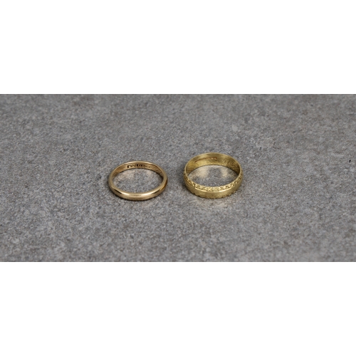 174 - Two 18ct yellow gold rings one of plain form, size K, the other a band with bright cut rims, inscrib... 