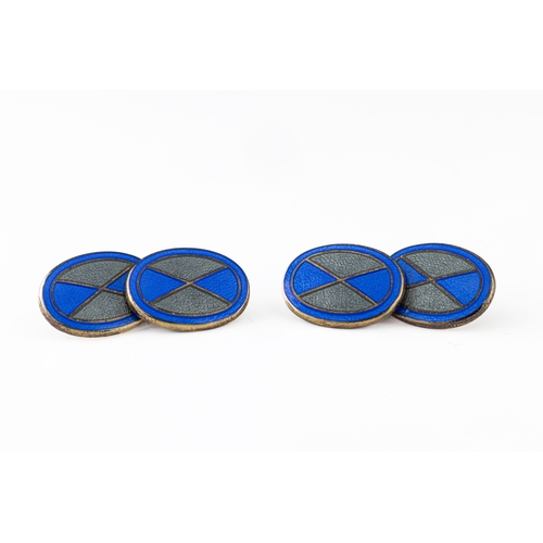 175 - A pair of silver and enamel oval cufflinks the 16mm x 12mm ovals with alternating panels of blue and... 