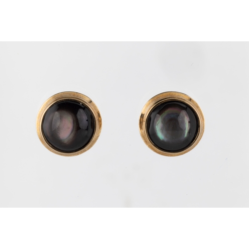 194 - A pair of 9ct yellow gold and haematite circular stud earrings approx 12mm diameter, total gross wei... 