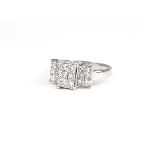 280 - An 18ct white gold and diamond ring hallmarked London 2003, the stepped setting with eighteen Prince... 