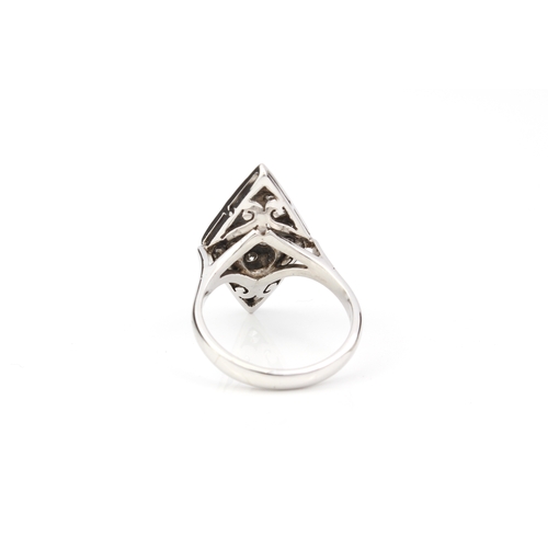 283 - An Art Deco style palladium and diamond plaque ring marked 'PALLADIUM' inside shank, the diamond-sha... 