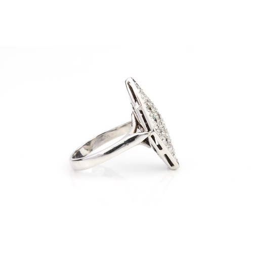 283 - An Art Deco style palladium and diamond plaque ring marked 'PALLADIUM' inside shank, the diamond-sha... 