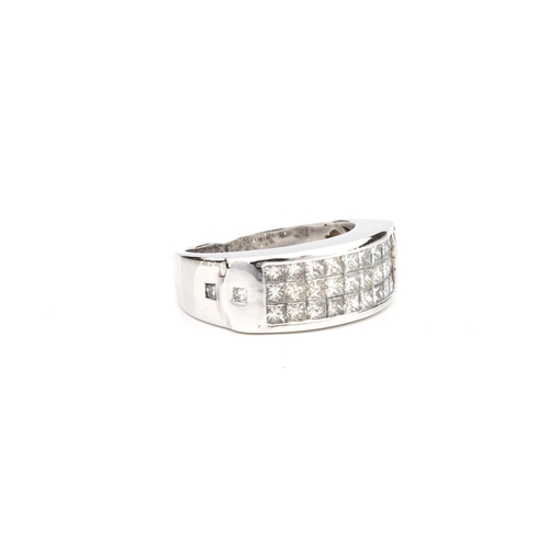 287 - An 18ct white gold and diamond three row ring unmarked, tests as 18ct gold, channel set with three r... 