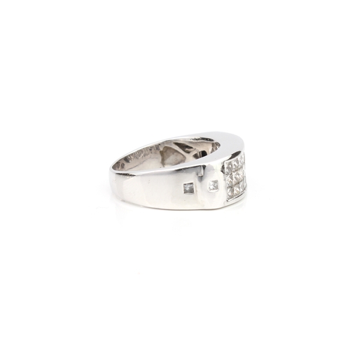 287 - An 18ct white gold and diamond three row ring unmarked, tests as 18ct gold, channel set with three r... 