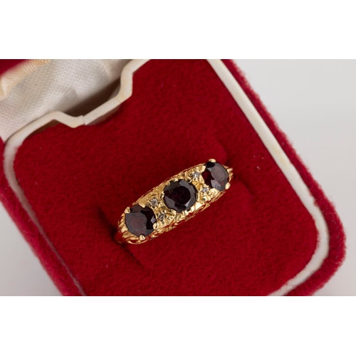 292 - A selection of gold and garnet jewellery to include one Victorian style 18ct yellow gold and garnet ... 