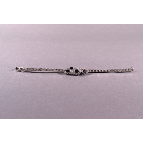 306 - A sapphire and diamond bracelet 18ct white gold set with brilliant cut white diamonds 2.35ct. approx... 