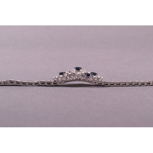 306 - A sapphire and diamond bracelet 18ct white gold set with brilliant cut white diamonds 2.35ct. approx... 