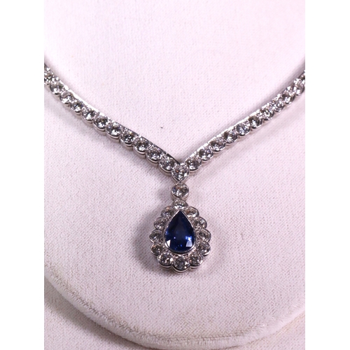 307 - A sapphire and diamond 18ct white gold necklace, set with 109 brilliant cut diamonds ending in V sha... 