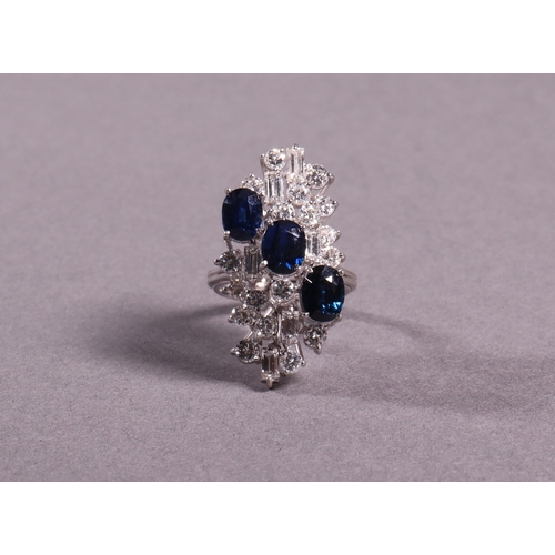 311 - A sapphire and diamond dress ring three sapphires set with 18 brilliant white diamonds and six bague... 