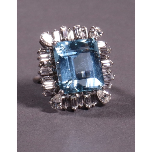 312 - An aquamarine and diamond set cluster ring comprising a single aquamarine surrounded by baguette and... 