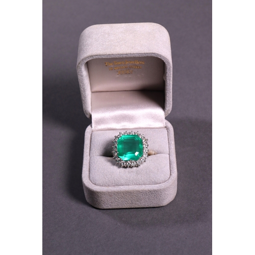 314 - An important square cut emerald and diamond ring set in 18ct. yellow and white gold, brilliant cut d... 