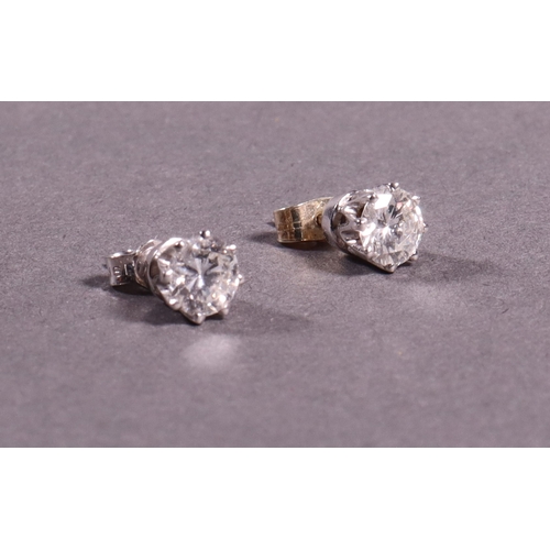 316 - A pair of solitaire diamond earrings brilliant cut, fine quality, 1.6ct. approx.