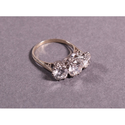 320 - A 3 stone diamond ring set in 18ct. white gold diamond weight 4.15ct approx.