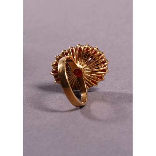 322 - A Bruce Russell 18ct yellow gold garnet cluster ring one oval garnet 18 x 13mm surrunded by 18 3mm g... 