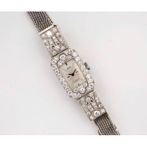 333 - A mid-century 18ct white gold and diamond cocktail watch the silvered rectangular dial signed 'UNO 1... 