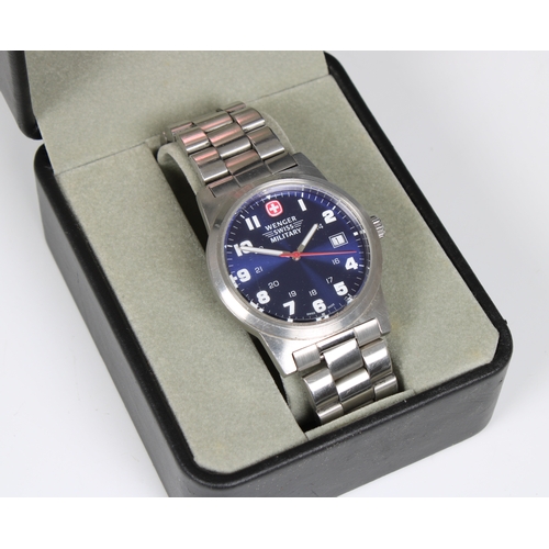 334 - A Wenger Swiss Military men's watch the blue dial framed by a stainless steel case and strap, in ori... 