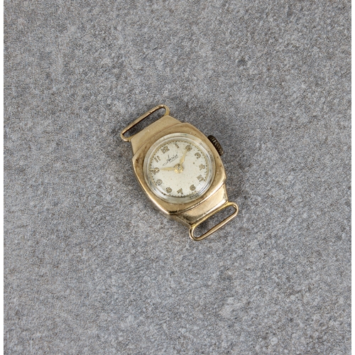 353 - A ladies gold Tissot wrist watch the small convex sided square face with baton hour markers on 9ct g... 