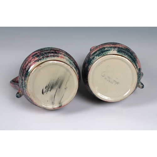 366 - A pair of 20th century Govancroft, Glasgow pottery lustre jugs mark beneath, 6 1/2 in. (16.5cm.) hig... 