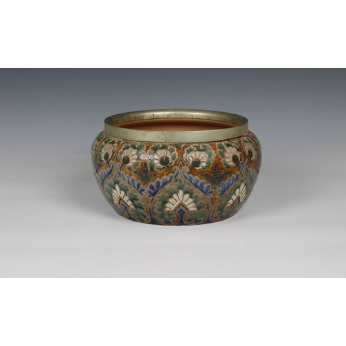 374 - Doulton Lambeth bowl / jardiniere having a metal rim, green and blue floral design on an ocher groun... 