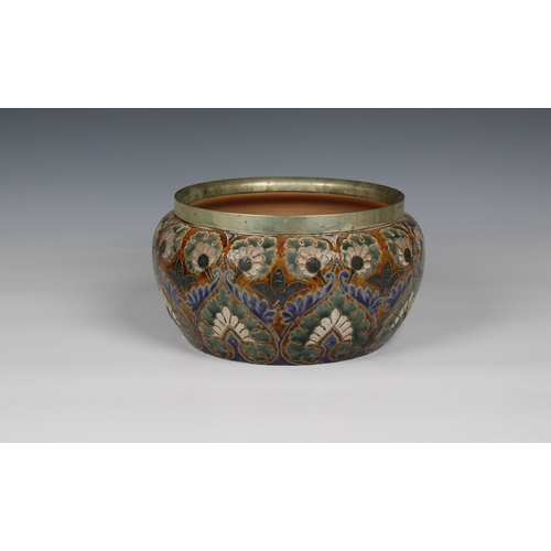 374 - Doulton Lambeth bowl / jardiniere having a metal rim, green and blue floral design on an ocher groun... 