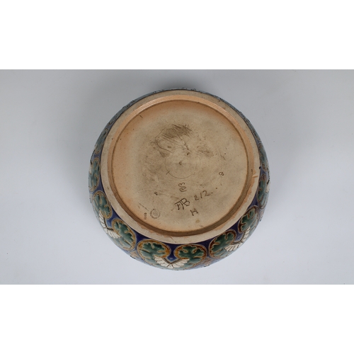 374 - Doulton Lambeth bowl / jardiniere having a metal rim, green and blue floral design on an ocher groun... 