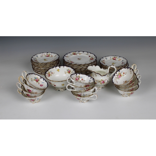 376 - A Cauldon England porcelain part tea set with floral sprig decoration, blue an gilded rims, comprisi... 