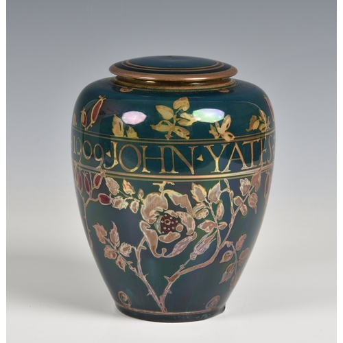 385 - Gordon Forsyth for Pilkington, a Royal Lancastrian ovoid lustre vase and cover, 1909, painted with f... 